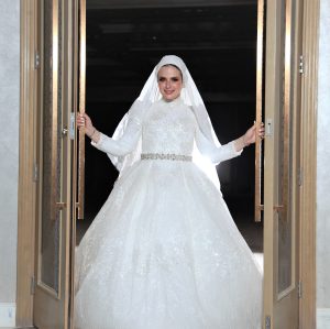 luxury modest sparkly wedding gown with train and assorted long veil